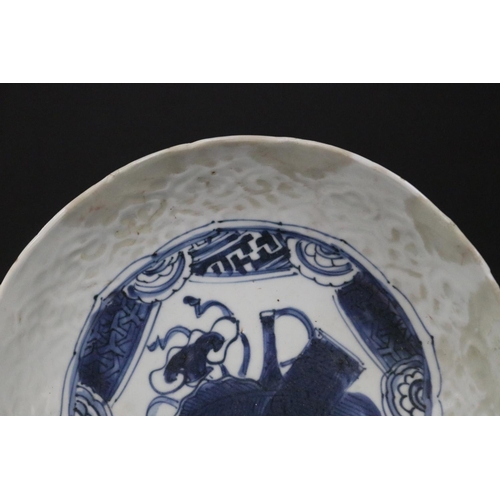 134 - Antique early Chinese porcelain bowl with central blue and white decoration. (restorations) Approx 2... 