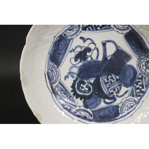 134 - Antique early Chinese porcelain bowl with central blue and white decoration. (restorations) Approx 2... 