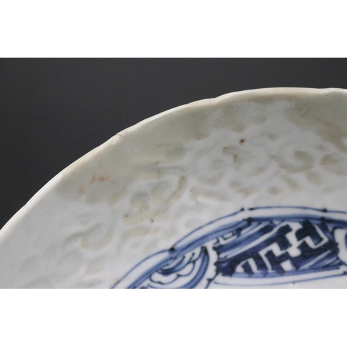 134 - Antique early Chinese porcelain bowl with central blue and white decoration. (restorations) Approx 2... 