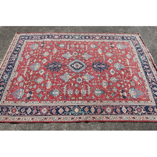 86 - Large handwoven carpet of red ground, approx 420 L x 300 W