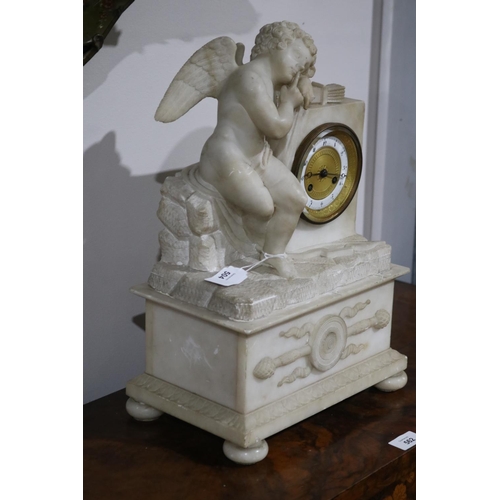 504 - Antique carved alabaster figural mantle clock, silk suspension movement, key and pendulum, approx 41... 