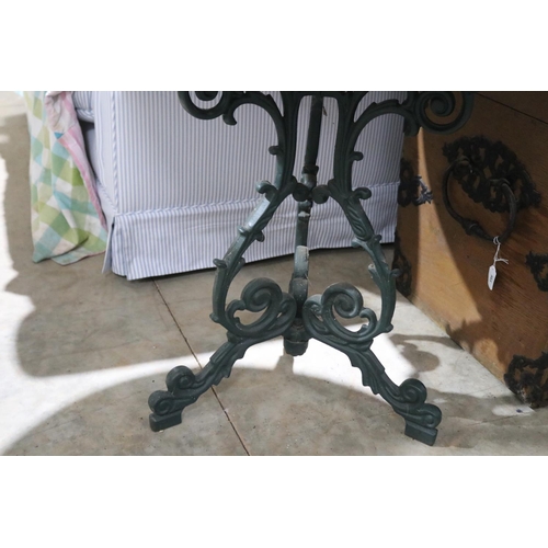 521 - English cast iron based circular wooden topped table, approx 74cm H x 75cm Dia