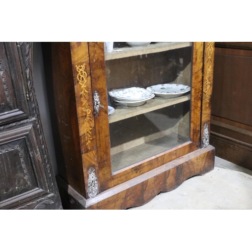 562 - Antique Victorian inlaid figured walnut pier cabinet, arched glazed single door, approx 86cm W x 31.... 