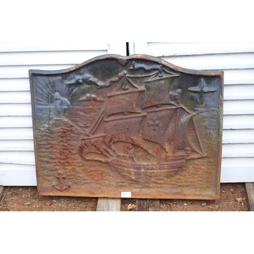 185 - Antique French cast iron arched fire back in relief with a galleon, approx 56cm x 71cm