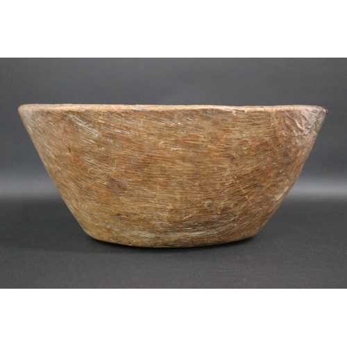 18 - Large carved antique oak bowl, with tin restoration section to the side, approx 17cm H x 41cm Dia