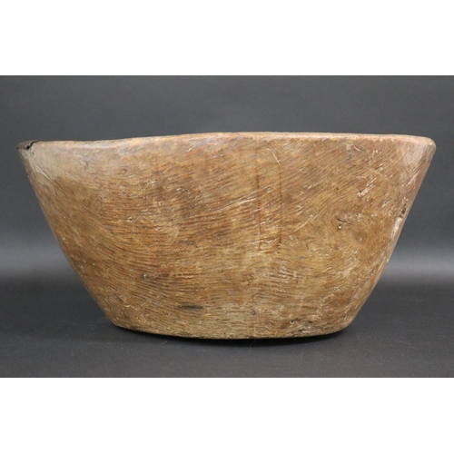 18 - Large carved antique oak bowl, with tin restoration section to the side, approx 17cm H x 41cm Dia