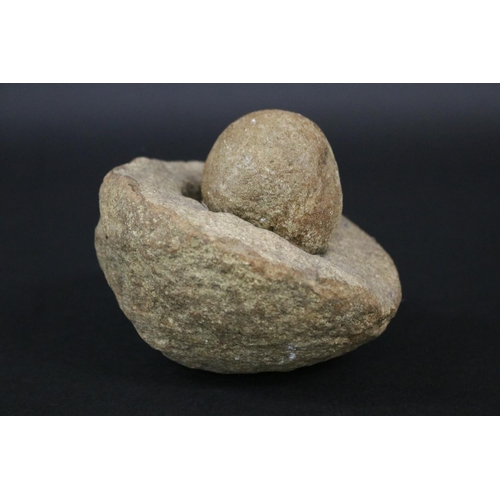 189 - Ancient carved stone mortar & pestle (grinder), approx 9cm H x 9cm W