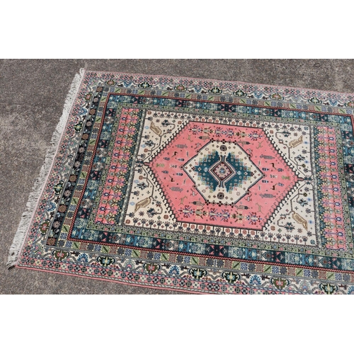 219 - Moroccan hand knotted wool carpet, approx 222cm x 306cm.