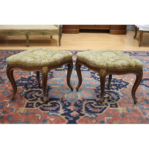 100 - Pair of antique Italian painted & parcel gilt walnut corner stools, mid-18th century, each shaped an... 