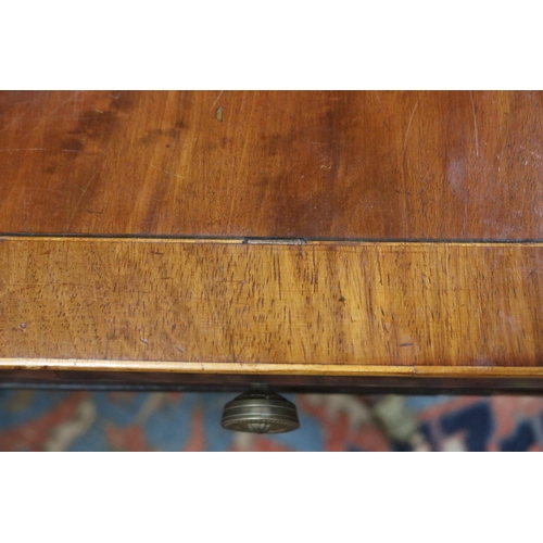 139 - Antique late George III mahogany sofa table, the twin flap rectangular top with canted corners cross... 