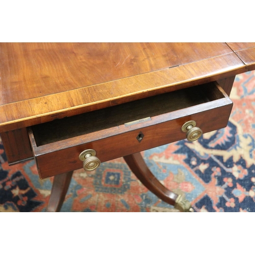 139 - Antique late George III mahogany sofa table, the twin flap rectangular top with canted corners cross... 