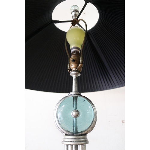 24 - Pair of modern green glass and iron lamps, with black pleated shades, in working condition at time o... 