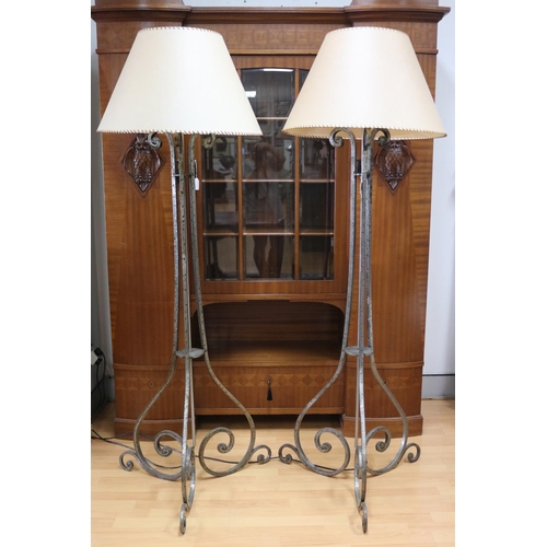 25 - Pair of Le Forge wrought iron floor lamps, tri form scrolling bases, each approx 176cm H (2) in work... 