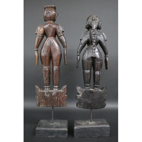99 - Pair of early 20th Century carved Marapcchi Bommais dolls from Southern India, approx 53cm H and sho... 