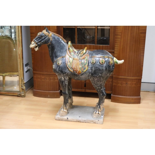 117 - Large Chinese Sancai figure of a caparisoned horse, standing four-square, with head slightly turned ... 