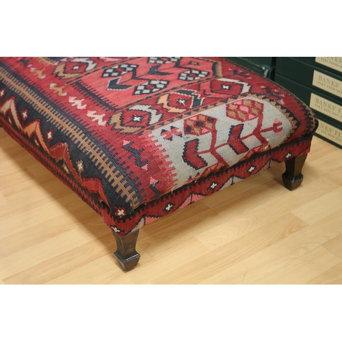 184 - Rectangular Kilim carpet upholstered foot stool, approx 26cm H x 104cm W x 56cm D