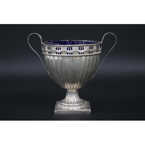 121 - Sterling silver pedestal twin handled cup, approx 15cm H x 17cm W and approx 315 grams excluding gla... 