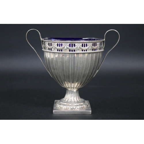 121 - Sterling silver pedestal twin handled cup, approx 15cm H x 17cm W and approx 315 grams excluding gla... 