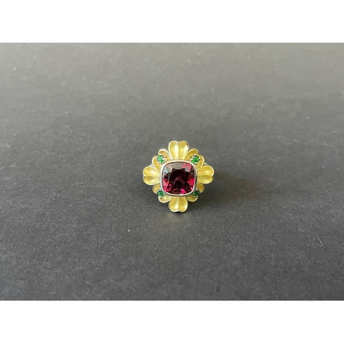 165 - 9ct and 18ct yellow and white gold flower design dress ring set with a large centre red stone and fo... 