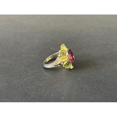 165 - 9ct and 18ct yellow and white gold flower design dress ring set with a large centre red stone and fo... 
