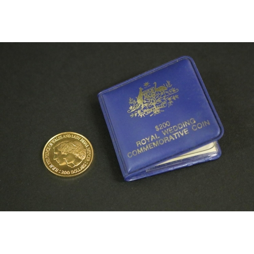 214 - Cased Australian $200 dollar .22 carat gold coin, 1981 Charles & Diana, in original fitted slip, app... 