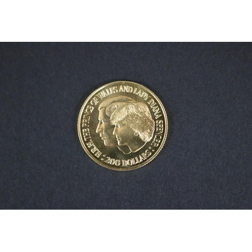 214 - Cased Australian $200 dollar .22 carat gold coin, 1981 Charles & Diana, in original fitted slip, app... 