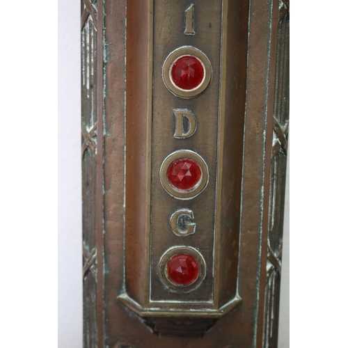 67 - Antique Bronze Elevator plate, in the Deco design, fitted with faceted red glass lights. floors- G-D... 
