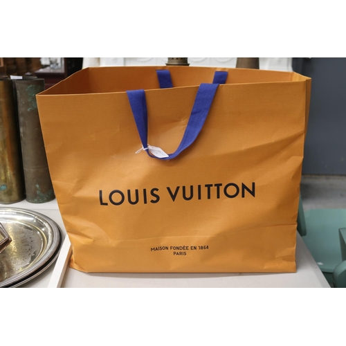 588 - Assortment of empty designer bags to include Louis Vuitton, Chanel, etc