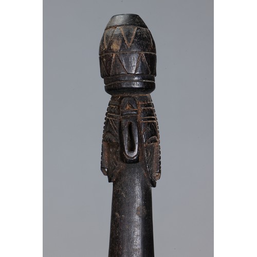 628 - Fine early Tami Island Sago Pounder, Papua New Guinea. Carved and engraved hardwood. Finely carved f... 