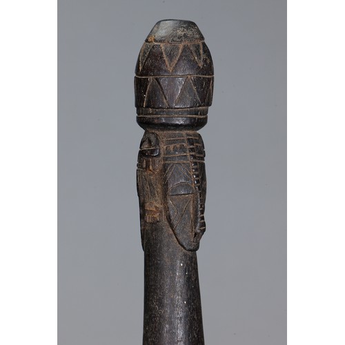 628 - Fine early Tami Island Sago Pounder, Papua New Guinea. Carved and engraved hardwood. Finely carved f... 