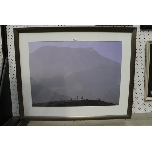 702 - Framed image, of figures in a mountainous scene approx 58cm x 81cm