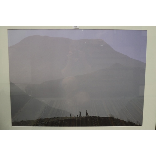 702 - Framed image, of figures in a mountainous scene approx 58cm x 81cm