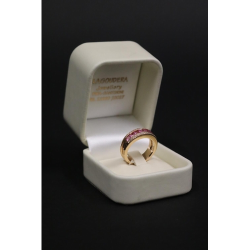 167 - 18ct rose gold ring set with pink sapphires and small diamonds, in original box. Purchased in Greece... 