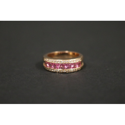 167 - 18ct rose gold ring set with pink sapphires and small diamonds, in original box. Purchased in Greece... 