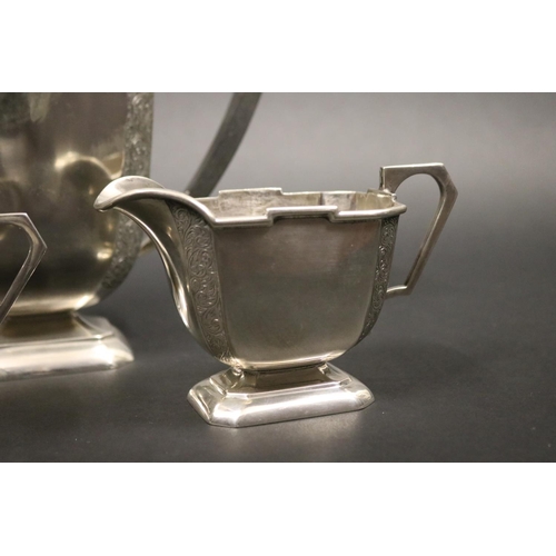 73 - Elizabeth II hallmarked sterling silver three piece coffee set comprising of a teapot, sugar and cre... 