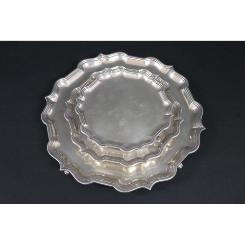 76 - Set of three Hardy Bros hallmarked sterling silver pie crust footed trays, London 1955-56 and 1956-5... 