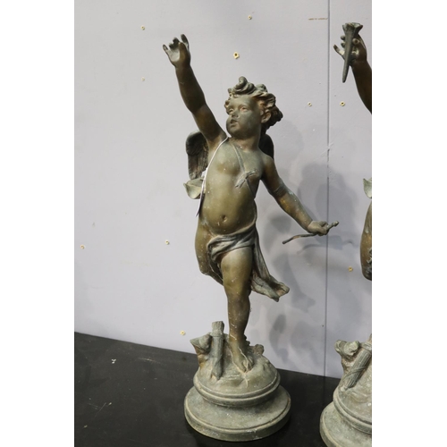 1 - Pair of cast metal figures of putto, each approx 57cm H (2)