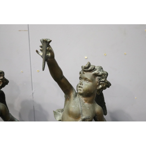 1 - Pair of cast metal figures of putto, each approx 57cm H (2)