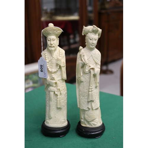 508 - Chinese resin Emperor/Empress decorative figures on timber stands, each approx 25cm H