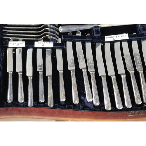 597 - Part canteen of silver plate cutlery in table canteen, approx 84cm H x 98cm W x 54cm D