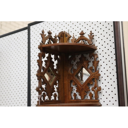 683 - Finely carved, hand pierced corner timber mirror, approx 47cm H x 27cm W