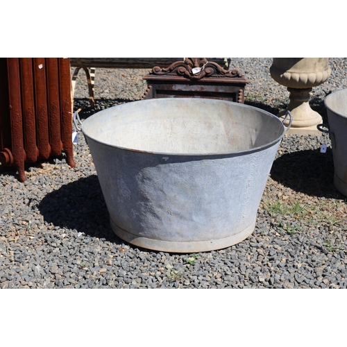 143 - Large antique French gal metal twin handled tub, approx 87.5cm handle to handle