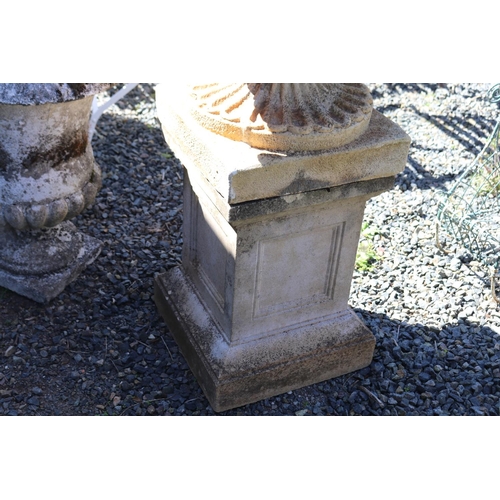21 - Large composite stone rollover rimed garden urn, with applied scrolling handles, on square pedestal ... 
