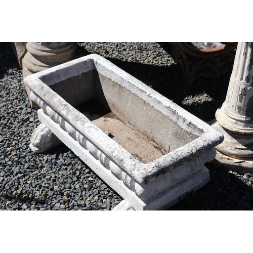 25 - Large French composite stone white rectangular planter with two movable mask head long feet supports... 