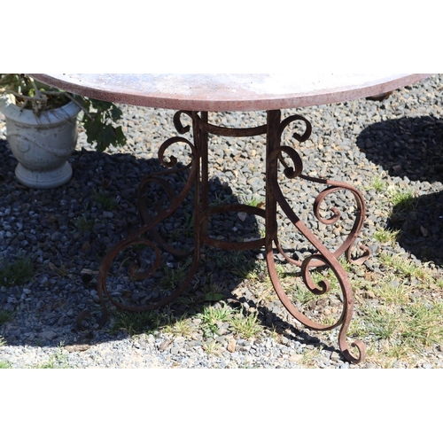 64 - Metal circular garden table, flat bar support base, rusty colour, approx 101cm Dia x 72cm H