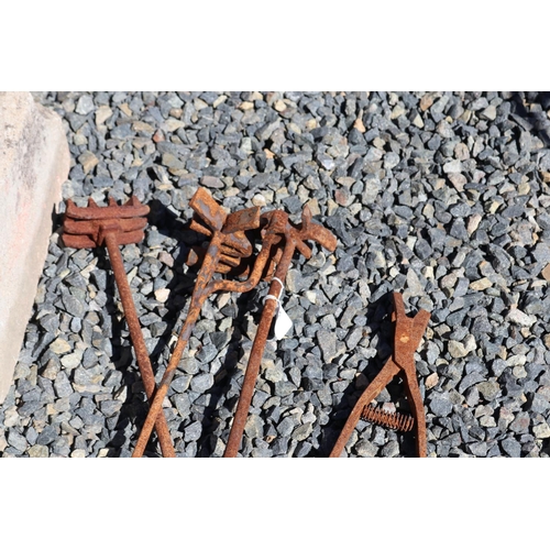 65 - Three old branding irons, approx 89cm L and shorter (3)