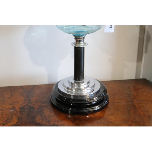 342 - Antique oil lamp, aqua glass reservoir with double burner, stepped chrome with black pottery base, 6... 