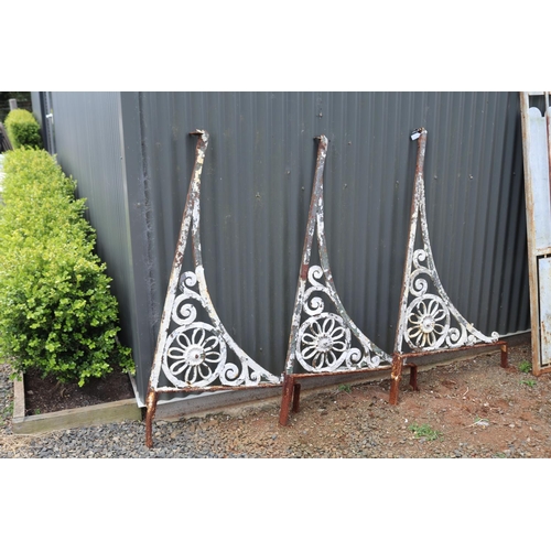 72 - The antique early 19th century French wrought iron awning brackets, approx 144cm L x 78cm H (3)