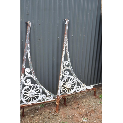 72 - The antique early 19th century French wrought iron awning brackets, approx 144cm L x 78cm H (3)