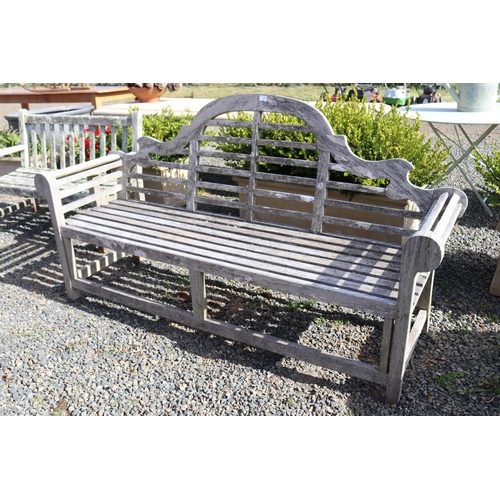 95 - Aged teak arched back garden bench seat, approx 198cm W